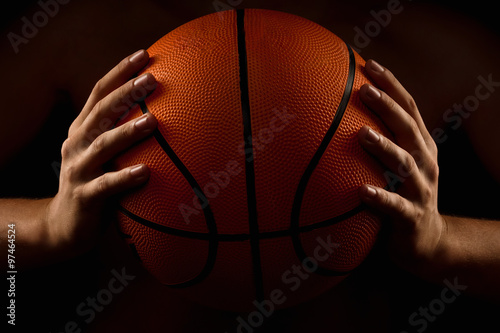 Basketball ball in male hands © Alexandr Vasilyev