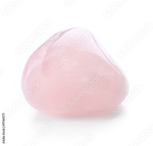 Pink quartz isolated on white background photo
