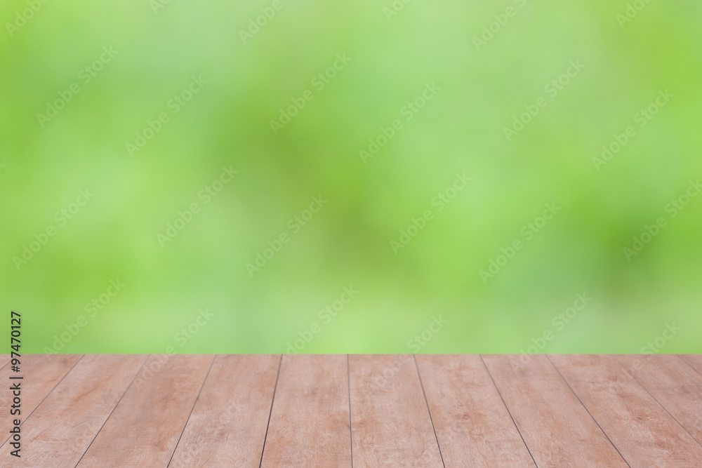 Wood table top on blurred nature abstract background. ready for product display