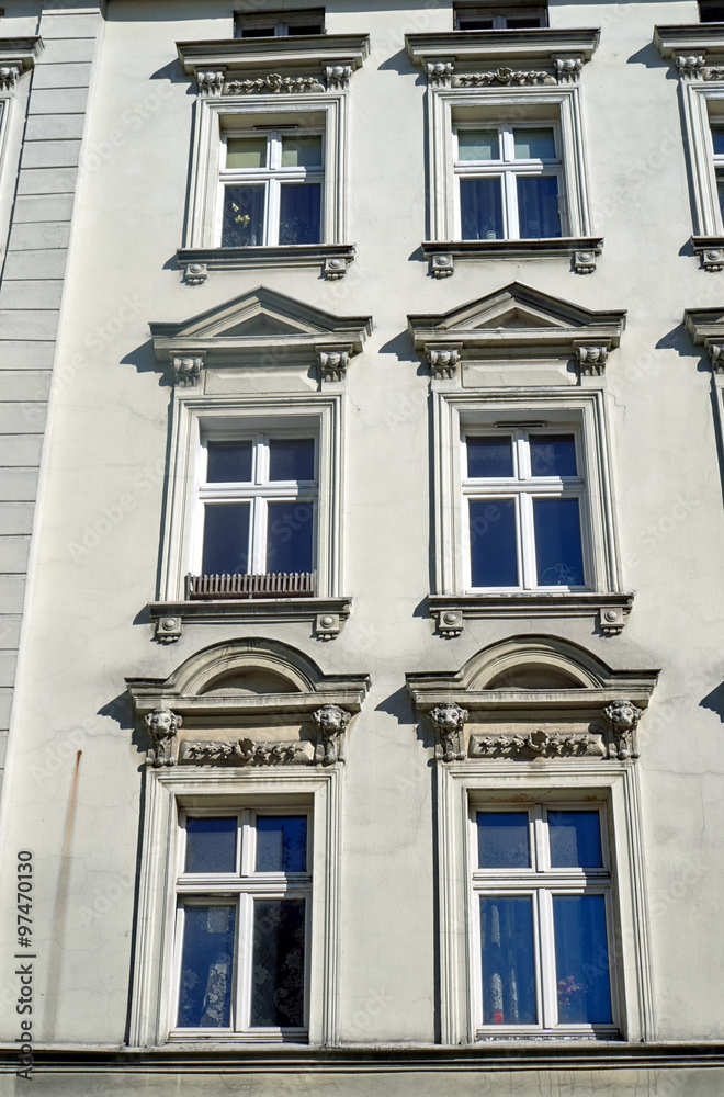 Windows on the facade of the Art Nouveau building in Poznan.