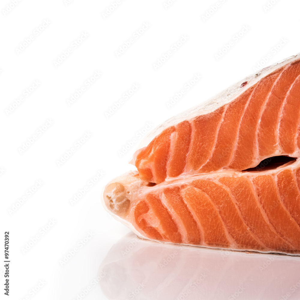 Piece of raw salmon on white