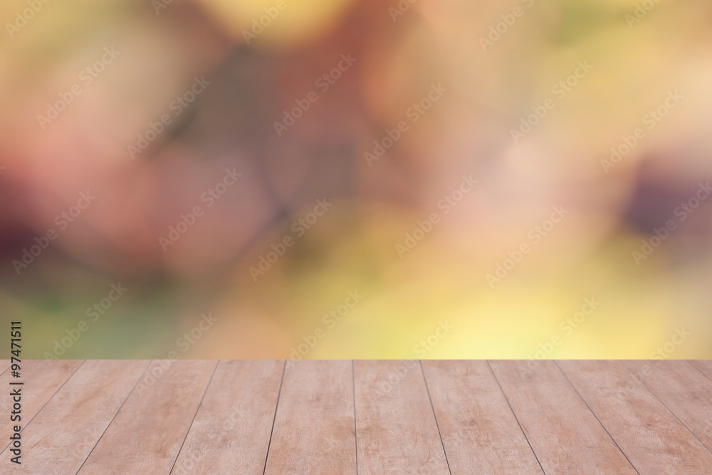 Wood table top on color abstract blurred background. ready for product display Wood table top on color abstract blurred background. ready for product display