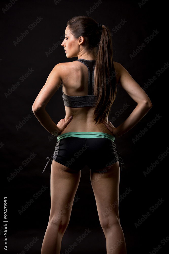 Obraz premium fitness woman on black background