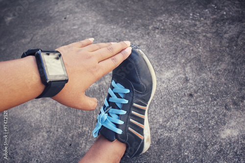 Woman exercises with smartwatch