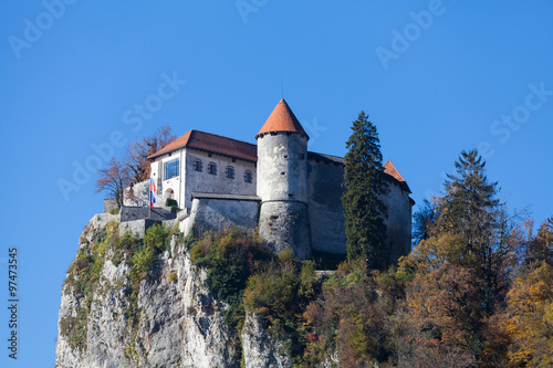 Bled Castle  built on top of a cliff overlooking lake
