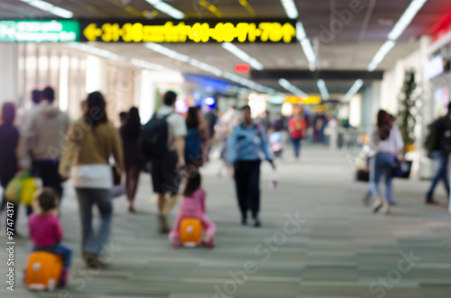 Passengers in Airport on blur background photo