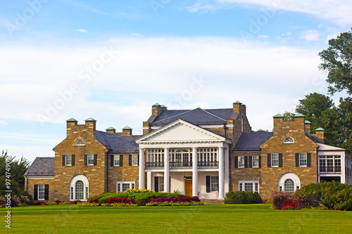 Glenview historic mansion with formal gardens at sunset. Historic Mansion at Civic Center Park in Rockville, Maryland, USA