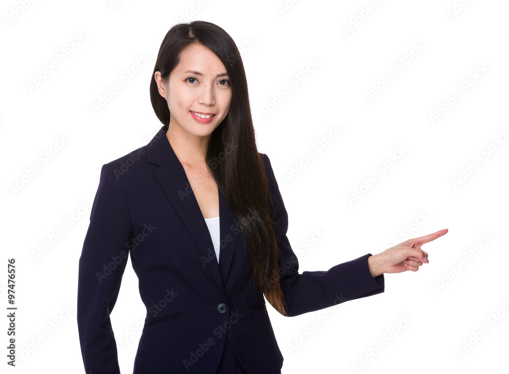 Asian Young Businesswoman pointing finger aside Asian Young Businesswoman pointing finger aside