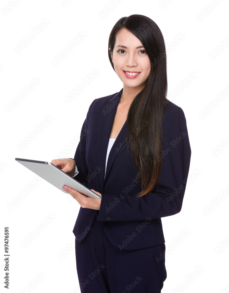 Asian Young Businesswoman use of the tablet pc Asian Young Businesswoman use of the tablet pc