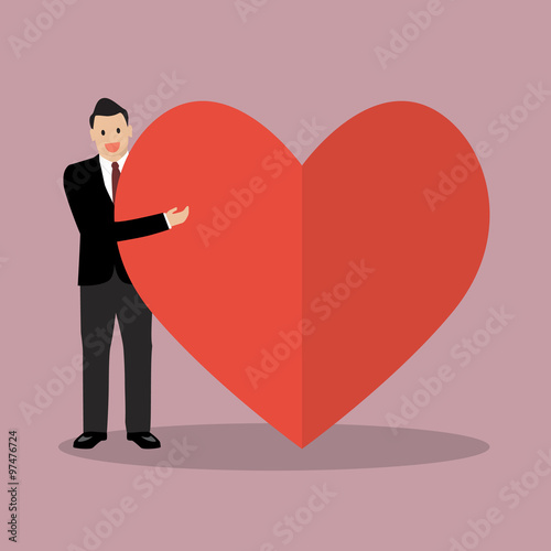 Businessman presenting the big heart