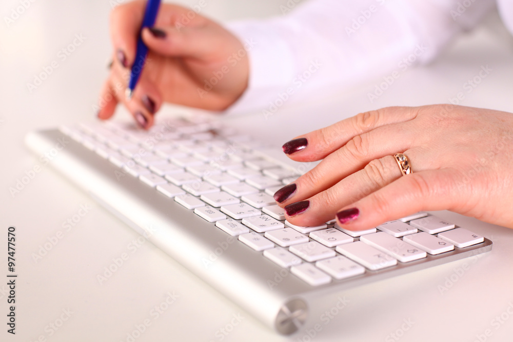 Young businesswoman working on a laptop Young businesswoman working on a laptop