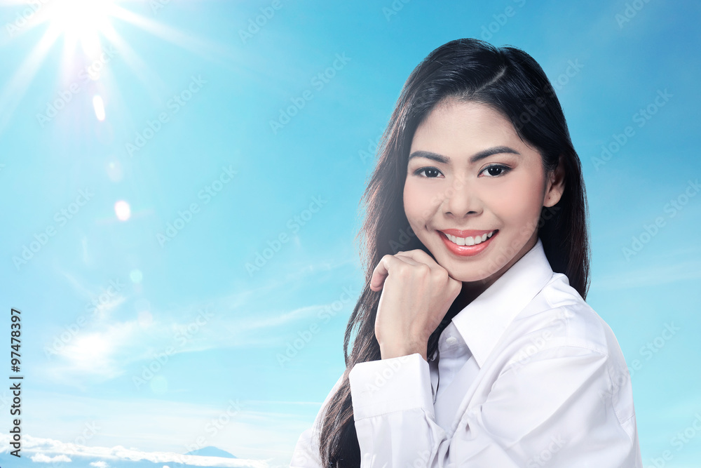 Pretty asian woman smiling wearing white shirt Pretty asian woman smiling wearing white shirt
