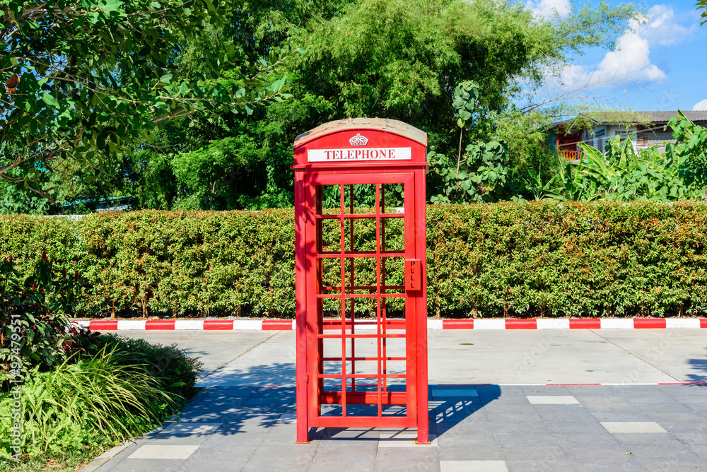 Red phone booths on the street Red phone booths on the street