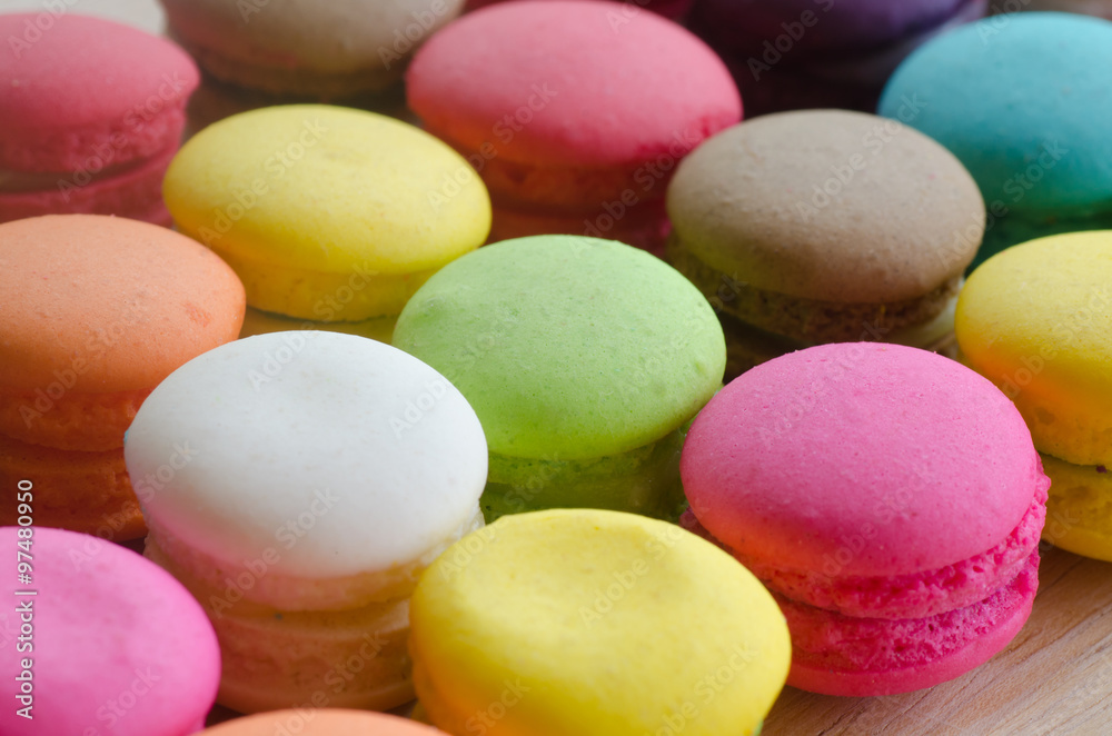 Colourful tasty macaroons in a row Colourful tasty macaroons in a row