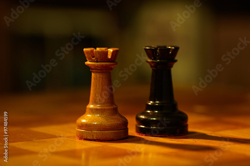 Chess. Chess pieces on a chessboard. Two rooks on a chessboard . Competition.