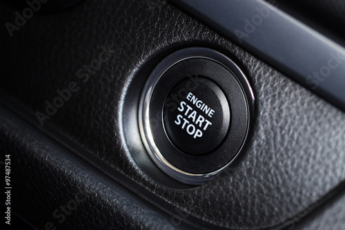 closeup start engine button of modern car © blackzheep