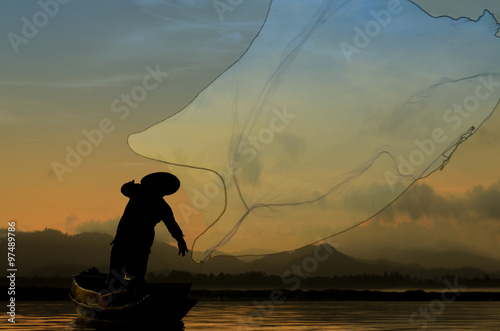 Fisherman in action when cast a net