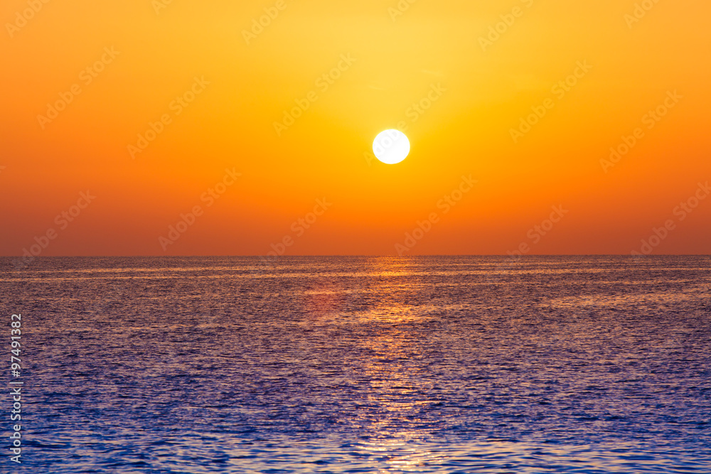 Beautiful sunset above the sea.  Scenic view of beautiful sunset