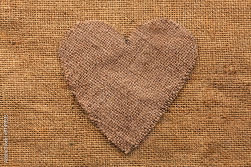 Conceptual image of the heart  lying on sackcloth
