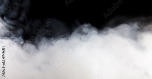 Abstract white fog or smoke move on black color background