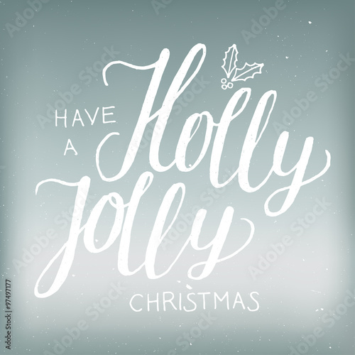 christmas calligraphy on ice background. have a holly jolly christmas