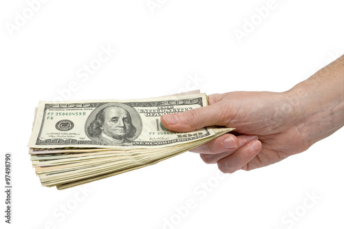 Pile of dollar banknotes in hand isolated on white. Clipping path incl.