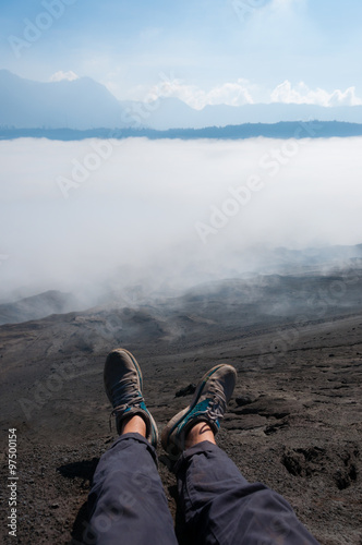 Feet with shoes in front Sheet of Fog smoke or Mist