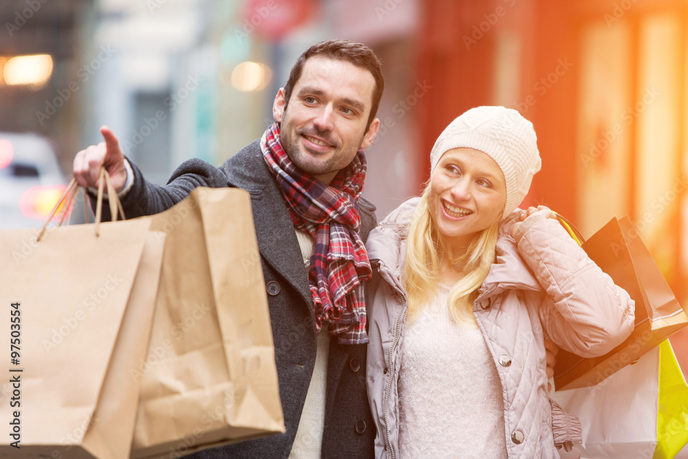 Young attractive couple with shopping bags Young attractive couple with shopping bags