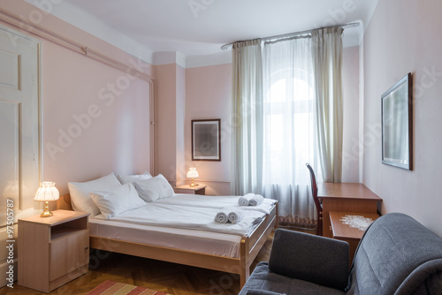 Hotel room interior with double bed