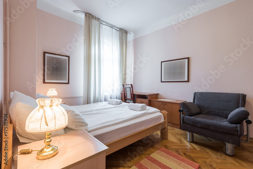 Hotel bedroom in pastel tones