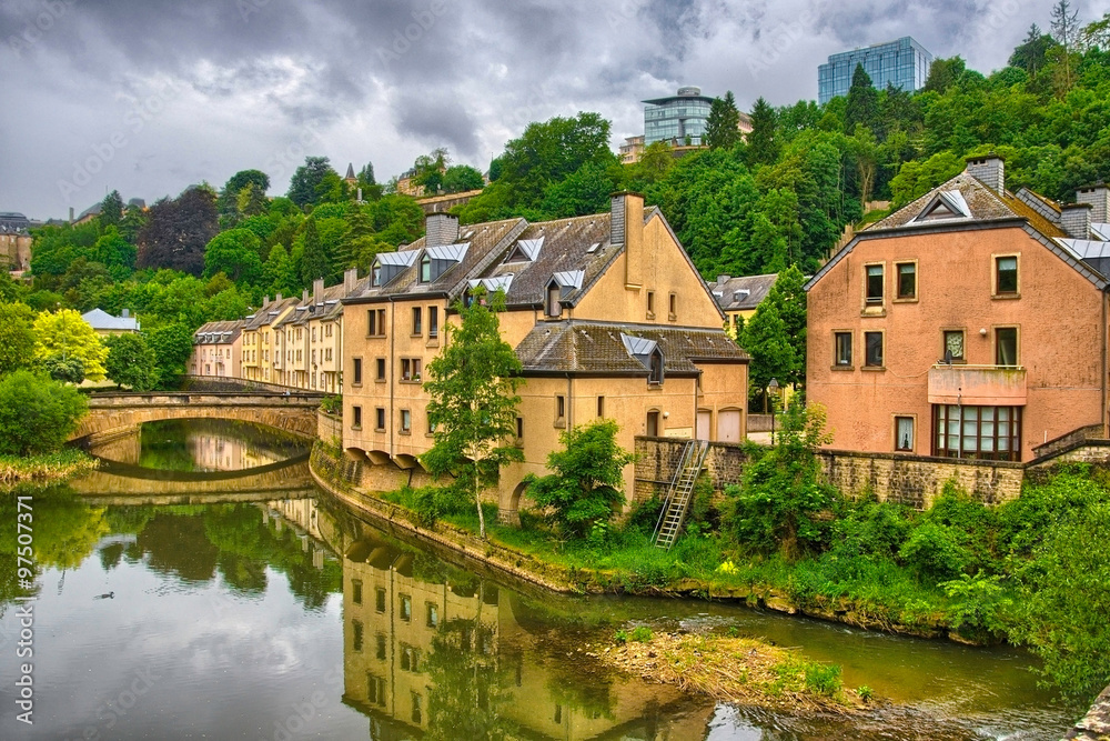 River with houses and bridges in Luxembourg, Benelux, HDR