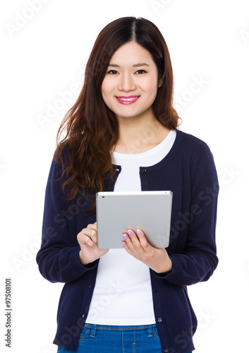 Asian Young Woman use of the tablet pc