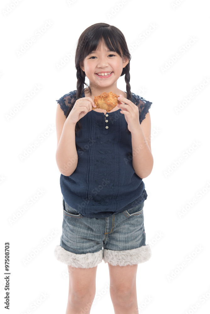 Cute asian girl eating fried chicken Cute asian girl eating fried chicken