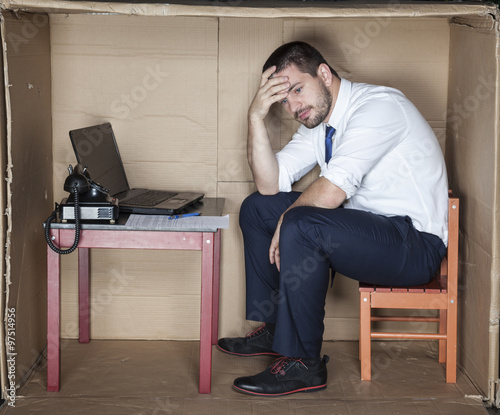 depressed businessman at corporate office