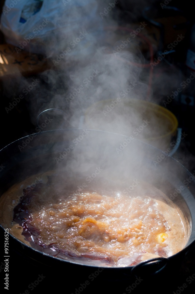 Traditional appetizing and tasty hungarian goulash soup in cauldron