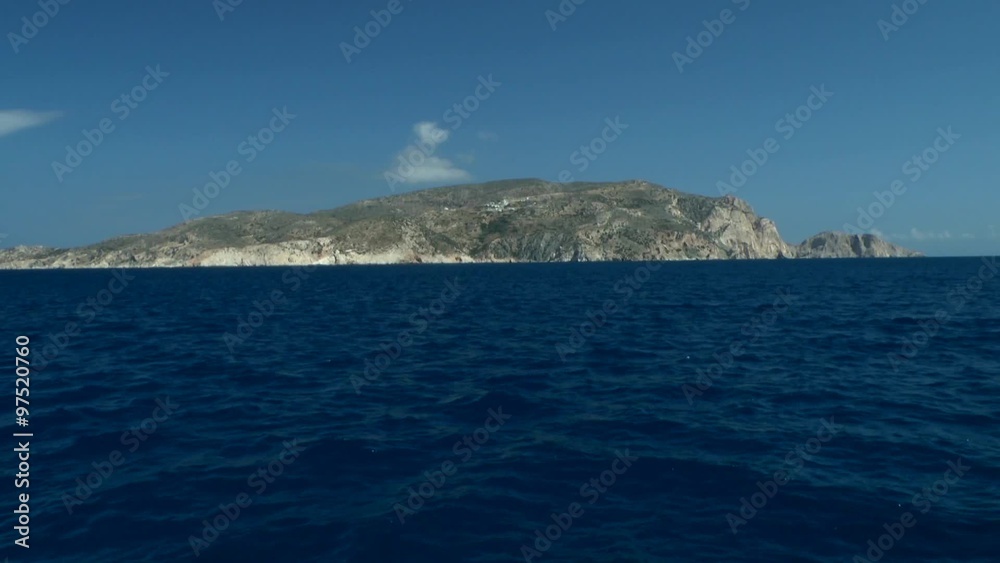 One of the Greek islands on the horizon, Amorgos island, Greece.
One of the Greek islands on the horizon, Amorgos island, Greece.
