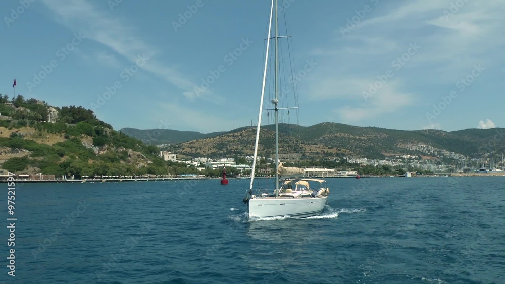 Sailing yacht running along the Turkish coast, Bodrum.
Sailing yacht running along the Turkish coast, Bodrum.