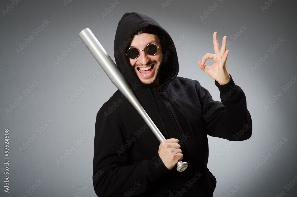 Aggressive man with basebal bat Aggressive man with basebal bat