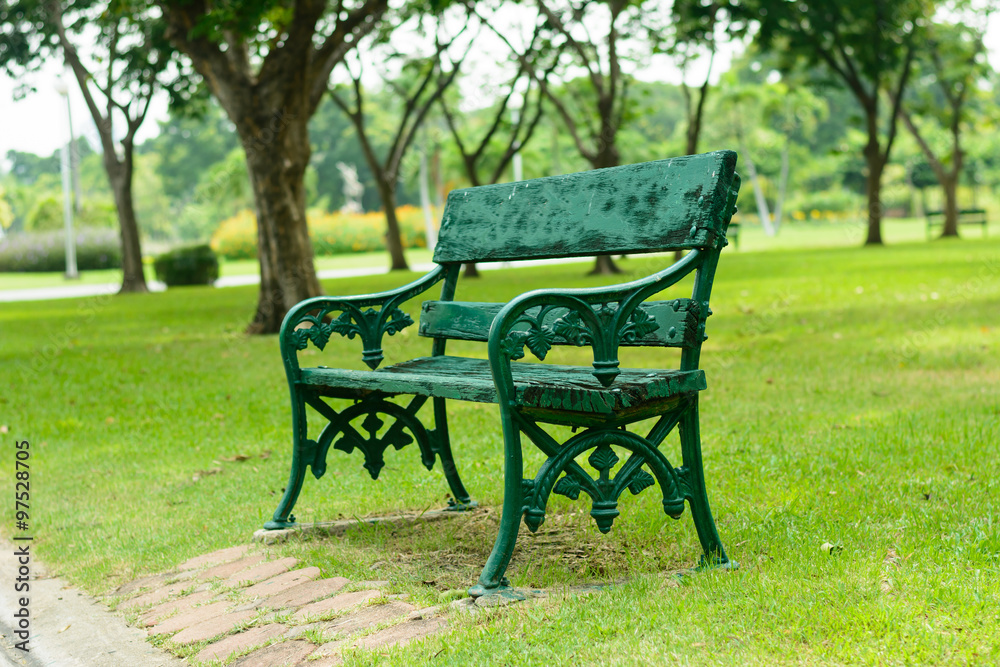 Stylish bench in summer park
