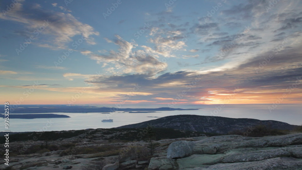 Pan of a portion of Frenchman Bay and the Porcupine Islands shortly before sunrise as seen from the top of Cadillac Mountain in Acadia National Park, Maine, USA. Pan of a portion of Frenchman Bay and the Porcupine Islands shortly before sunrise as seen from the top of Cadillac Mountain in Acadia National Park, Maine, USA.