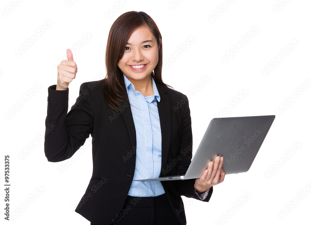 Asian Young Businesswoman use of the laptop computer and thumb u Asian Young Businesswoman use of the laptop computer and thumb u