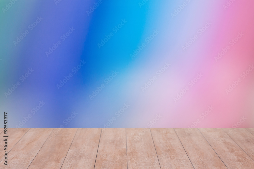 Wood table top on color abstract blurred background. ready for product display Wood table top on color abstract blurred background. ready for product display