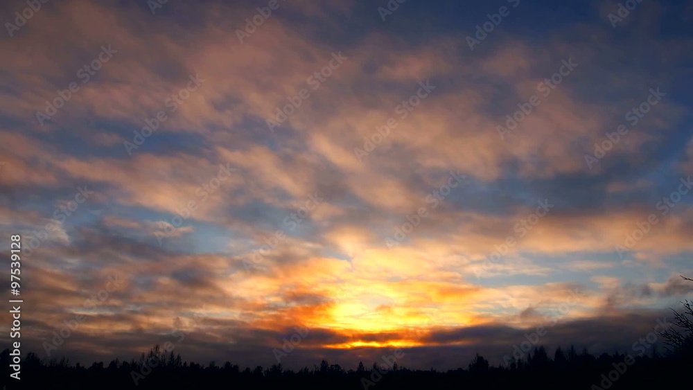 Sunset in the clouds. Fast clouds in the sky. The red sunset. Sun in the clouds. The sky at sunset. Clouds over the forest. The nature is beautiful. Beautiful sky. Sunset in the clouds. Fast clouds in the sky. The red sunset. Sun in the clouds. The sky at sunset. Clouds over the forest. The nature is beautiful. Beautiful sky.