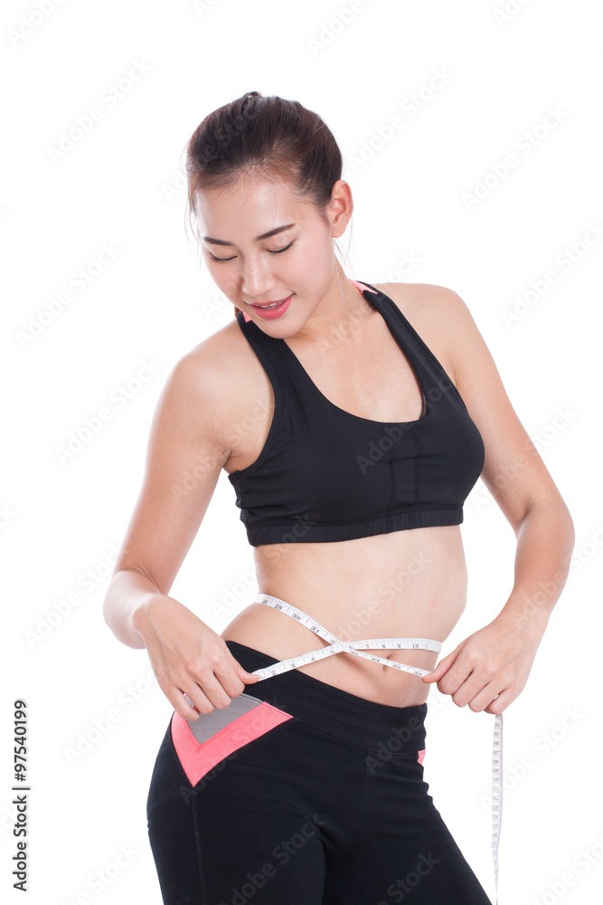 Fitness young woman taking measurements of her body. healthy concept Fitness young woman taking measurements of her body. healthy concept