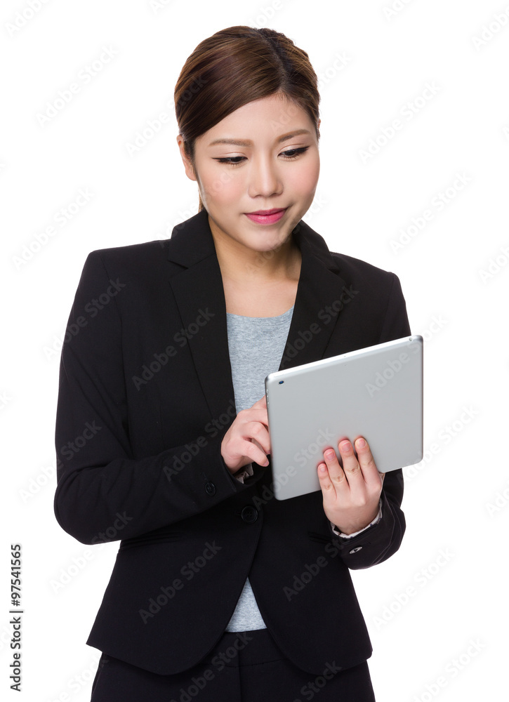 Young Businesswoman use of the tablet pc Young Businesswoman use of the tablet pc