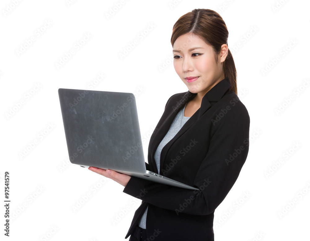 Asian Businesswoman use of the notebook computer Asian Businesswoman use of the notebook computer