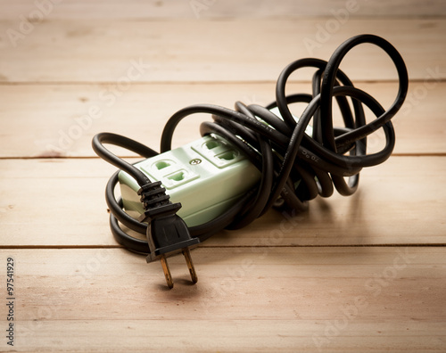 Electric extension strip on wood