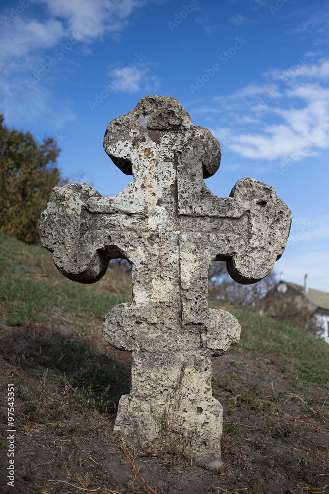 Old orthodox cross near the Cathedral of the Transfiguration of the Saviour