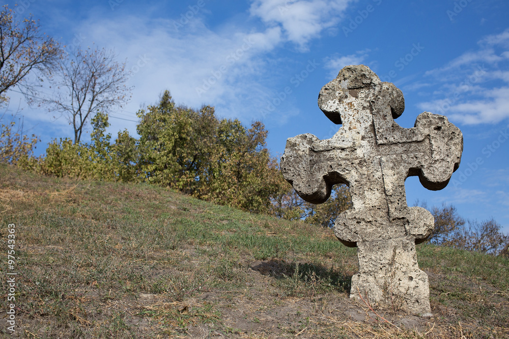 Old orthodox cross near the Cathedral of the Transfiguration of the Saviour Old orthodox cross near the Cathedral of the Transfiguration of the Saviour