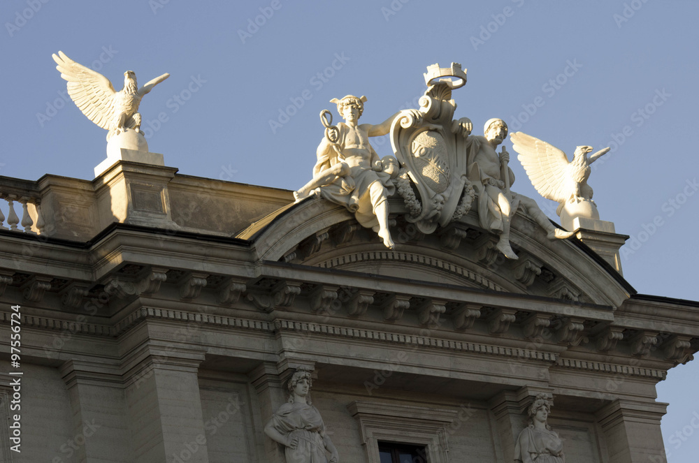 Close up of the statues on the building roof of Piazza della Repubblica in Rome